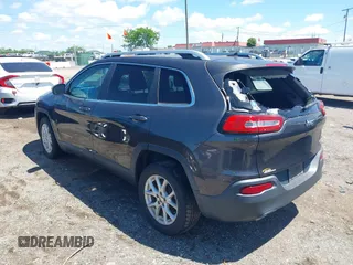 2014 Jeep Cherokee Latitude with VIN 1C4PJLCS0EW297415, listed as a IAAI auction lot 42198645 with 160,268 mi miles. Bid and sale history available at carsss.com. Image 3.