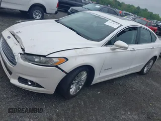 2014 Ford Fusion SE Hybrid с VIN 3FA6P0LUXER125766, выставлен на аукционе IAAI как лот 42178177 с пробегом 284 385 миль миль и . История ставок и продаж доступна на DreamBid. Изображение 2.