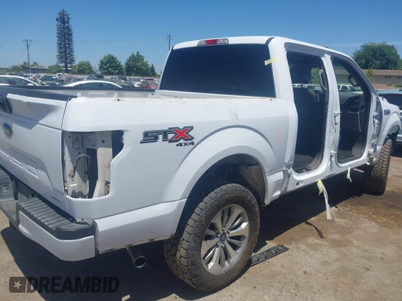 2018 Ford F-150 XL with VIN 1FTEW1EP8JKF82063, listed as a IAAI auction lot 42299414 with 153,706 mi miles and . Bid and sale history available at DreamBid. Image 4.