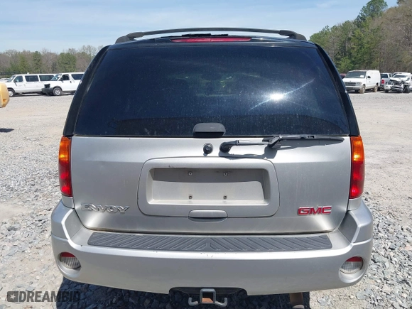 2005 GMC Envoy SLE with VIN 1GKDS13S652390259, listed as a IAAI auction lot 41825258 with 162,172 mi miles. Bid and sale history available at carsss.com. Image 16.