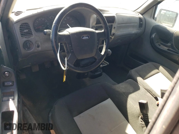 2009 Ford Ranger XLT with VIN 1FTZR45E69PA06141, listed as a Copart auction lot 43617815 with 102,986 mi miles and Salvage title. Bid and sale history available at DreamBid. Image 8.