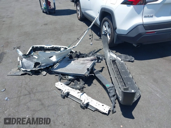 2019 Toyota RAV4 XLE with VIN JTMP1RFV8KD025971, listed as a IAAI auction lot 42673361 with 69,241 mi miles and . Bid and sale history available at DreamBid. Image 12.