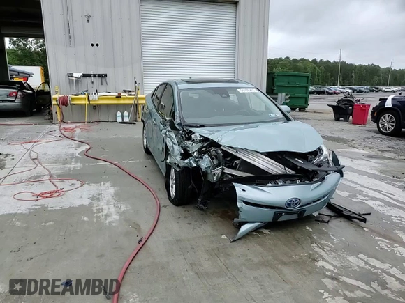 2016 Toyota Prius Four z VIN JTDKARFU1G3006158, wystawiony jako Copart lot #56500265 z przebiegiem 57 418 mil mil oraz Szkoda całkowita • Salvage title. Historia ofert i sprzedaży dostępna na DreamBid. Obrazek 14.