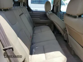 2008 Honda Ridgeline RTX z VIN 2HJYK16318H528170, wystawiony jako Copart lot #56859545 z przebiegiem 295 543 mil mil oraz Czysty tytuł • Clean title. Historia ofert i sprzedaży dostępna na DreamBid. Obrazek 11.