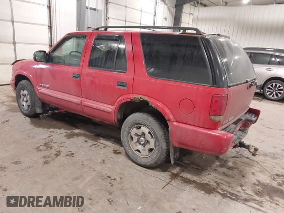 2004 Chevrolet Blazer LS z VIN 1GNDT13X34K157353, wystawiony jako IAAI lot #41089017 z przebiegiem 104 539 mil mil oraz . Historia ofert i sprzedaży dostępna na DreamBid. Obrazek 3.