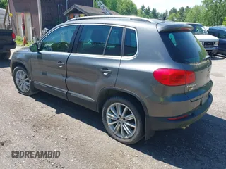 2013 Volkswagen Tiguan SE z VIN WVGBV7AX1DW006709, wystawiony jako IAAI lot #42388899 z przebiegiem 150 903 mil mil oraz . Historia ofert i sprzedaży dostępna na DreamBid. Obrazek 3.