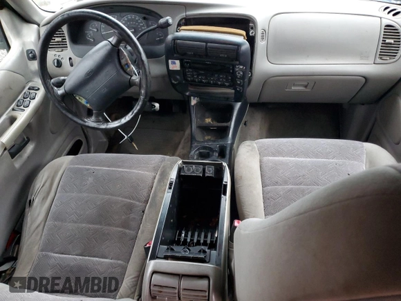 2000 Ford Explorer with VIN 1FMZU63X2YUA56061, listed as a Copart auction lot 45004465 with 117,860 mi miles and Salvage title. Bid and sale history available at DreamBid. Image 8.