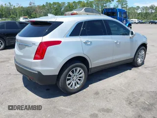 2019 Cadillac XT5 FWD with VIN 1GYKNARS4KZ259863, listed as a IAAI auction lot 42603196 with 51,251 mi miles and . Bid and sale history available at DreamBid. Image 4.