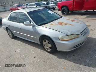 2001 Honda Accord EX with VIN 1HGCG16561A055728, listed as a IAAI auction lot 42656160 with 166,430 mi miles and . Bid and sale history available at DreamBid. Image 1.