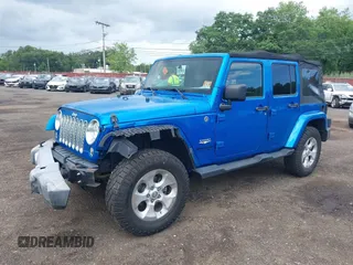2015 Jeep Wrangler Unlimited Sahara with VIN 1C4BJWEG4FL677879, listed as a IAAI auction lot 42676097 with 85,821 mi miles and . Bid and sale history available at DreamBid. Image 6.
