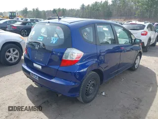 2013 Honda Fit with VIN JHMGE8H36DC017403, listed as a IAAI auction lot 42044816 with 206,688 mi miles. Bid and sale history available at carsss.com. Image 4.