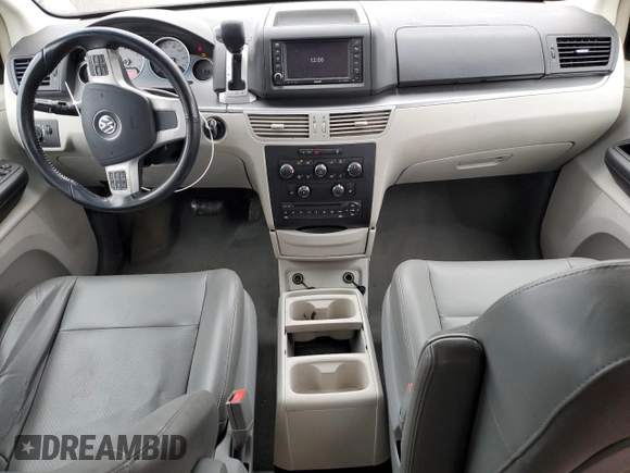 2014 Volkswagen Routan SE with VIN 2C4RVABG5ER135304, listed as a Copart auction lot 83957644 with 118,035 mi miles and Clean title. Bid and sale history available at DreamBid. Image 8.