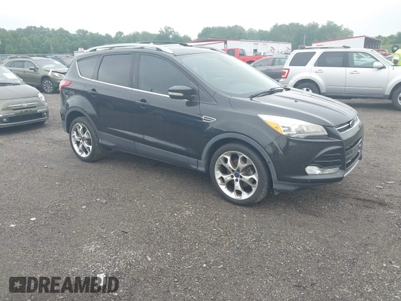 2015 Ford Escape Titanium z VIN 1FMCU0JX7FUB00462, wystawiony jako IAAI lot #42532943 z przebiegiem 88 623 mil mil oraz . Historia ofert i sprzedaży dostępna na DreamBid. Obrazek 1.