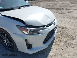 2016 Scion tC with VIN JTKJF5C70GJ019590, listed as a IAAI auction lot 41798426 with 69,045 mi miles. Bid and sale history available at carsss.com. Image 20.