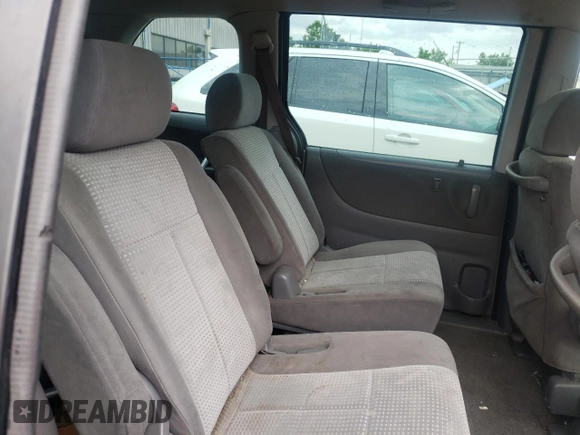 2005 Mazda MPV LX z VIN JM3LW28A050552617, wystawiony jako Copart lot #46936932 z przebiegiem 260 897 mil mil oraz Nie do naprawy • Non repairable. Historia ofert i sprzedaży dostępna na DreamBid. Obrazek 6.
