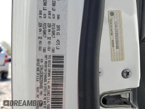 2016 Jeep Compass Latitude z VIN 1C4NJDEB6GD594486, wystawiony jako Copart lot #53440825 z przebiegiem Nie podano mil oraz Szkoda całkowita • Salvage title. Historia ofert i sprzedaży dostępna na DreamBid. Obrazek 14.
