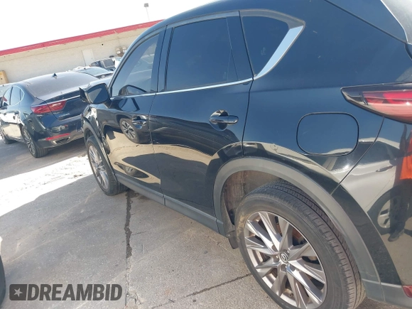 2019 Mazda CX-5 Grand Touring with VIN JM3KFBDM2K0564047, listed as a IAAI auction lot 42000455 with 152,590 mi miles and . Bid and sale history available at carsss.com. Image 14.