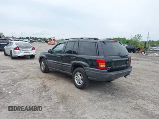 2004 Jeep Grand Cherokee Laredo z VIN 1J4GW48S54C198115, wystawiony jako IAAI lot #42351240 z przebiegiem 189 416 mil mil oraz . Historia ofert i sprzedaży dostępna na DreamBid. Obrazek 3.