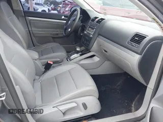 2009 Volkswagen Jetta SE z VIN 3VWRM71K99M167159, wystawiony jako IAAI lot #42409998 z przebiegiem 78 459 mil mil oraz . Historia ofert i sprzedaży dostępna na DreamBid. Obrazek 5.