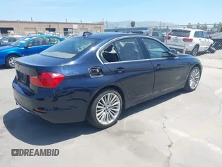 2012 BMW 3 Series 328i with VIN WBA3A5G59CNP16943, listed as a IAAI auction lot 42272421 with 195,089 mi miles and . Bid and sale history available at DreamBid. Image 4.