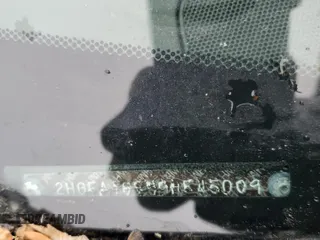 2009 Honda Civic LX z VIN 2HGFA16599H545009, wystawiony jako Copart lot #56104405 z przebiegiem Nie podano mil oraz Szkoda całkowita • Salvage title. Historia ofert i sprzedaży dostępna na DreamBid. Obrazek 12.