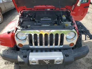 2012 Jeep Wrangler Unlimited Sahara with VIN 1C4BJWEG0CL128417, listed as a Copart auction lot 56243815 with 95,635 mi miles and Salvage title. Bid and sale history available at DreamBid. Image 12.