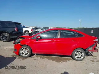 2014 Ford Fiesta SE with VIN 3FADP4BJ9EM174329, listed as a IAAI auction lot 42003743 with 86,744 mi miles. Bid and sale history available at carsss.com. Image 14.