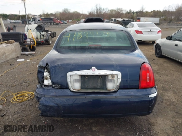 2001 Lincoln Town Car Signature with VIN 1LNHM82W61Y733577, listed as a IAAI auction lot 41899175 with 105,083 mi miles and . Bid and sale history available at DreamBid. Image 16.