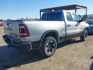 2019 Ram 1500 Rebel with VIN 1C6RRFEG8KN887978, listed as a IAAI auction lot 41433105 with 103,965 mi miles. Bid and sale history available at carsss.com. Image 4.