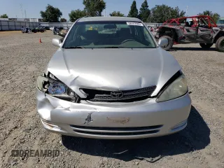 2002 Toyota Camry LE z VIN 4T1BE32KX2U037722, wystawiony jako Copart lot #58482805 z przebiegiem 154 207 mil mil oraz Szkoda całkowita • Salvage title. Historia ofert i sprzedaży dostępna na DreamBid. Obrazek 5.