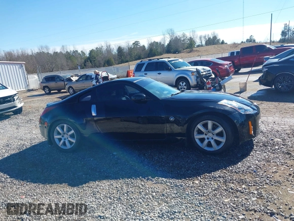 2003 Nissan 350Z Touring z VIN JN1AZ34E73T014727, wystawiony jako IAAI lot #41377420 z przebiegiem 170 323 mil mil oraz . Historia ofert i sprzedaży dostępna na DreamBid. Obrazek 14.