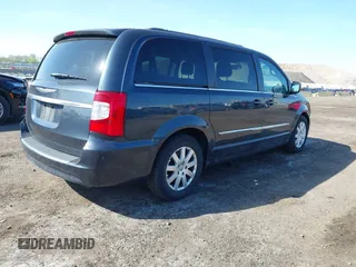 2014 Chrysler Town & Country Touring with VIN 2C4RC1BG7ER132197, listed as a IAAI auction lot 42153347 with 72,399 mi miles. Bid and sale history available at carsss.com. Image 4.