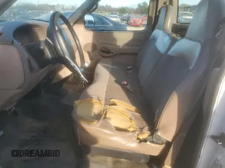1998 Ford F-150 с VIN 1FTZF1722WNB48794, выставлен на аукционе Copart как лот 45020325 с пробегом 304 711 миль миль и Списание • Salvage title. История ставок и продаж доступна на DreamBid. Изображение 7.