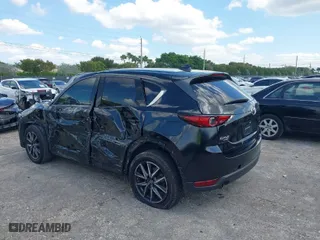 2018 Mazda CX-5 Grand Touring with VIN JM3KFBDM2J0390611, listed as a IAAI auction lot 42006482 with 97,497 mi miles. Bid and sale history available at carsss.com. Image 3.