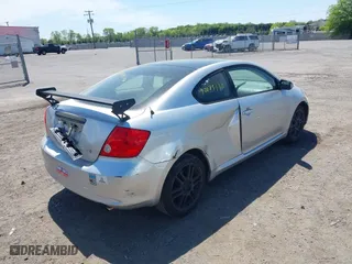 2006 Scion tC with VIN JTKDE177060139123, listed as a IAAI auction lot 42075140 with 218,391 mi miles. Bid and sale history available at carsss.com. Image 4.