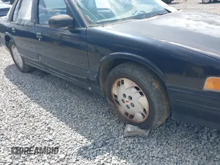 1996 Oldsmobile Cutlass Supreme S z VIN 1G3WH52M2TF363353, wystawiony jako IAAI lot #41955292 z przebiegiem 143 347 mil mil oraz . Historia ofert i sprzedaży dostępna na DreamBid. Obrazek 13.