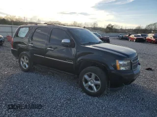 2013 Chevrolet Tahoe LTZ with VIN 1GNSCCE04DR162474, listed as a Copart auction lot 49386335 with 331,358 mi miles and Salvage title. Bid and sale history available at DreamBid. Image 4.