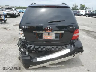 2006 Mercedes-Benz M-Class 5.0L with VIN 4JGBB75E56A122979, listed as a Copart auction lot 54207335 with 164,056 mi miles and Salvage Title. Bid and sale history available at carsss.com. Image 6.