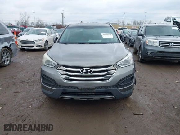 2016 Hyundai Santa Fe z VIN 5XYZTDLB1GG343763, wystawiony jako IAAI lot #41659641 z przebiegiem 96 415 mil mil oraz . Historia ofert i sprzedaży dostępna na DreamBid. Obrazek 12.