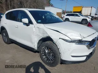 2017 Mazda CX-5 Touring z VIN JM3KFBCL8H0214052, wystawiony jako IAAI lot #41940783 z przebiegiem 120 083 mil mil oraz . Historia ofert i sprzedaży dostępna na DreamBid. Obrazek 1.
