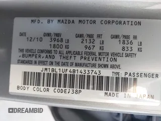2011 Mazda Mazda3 i Sport with VIN JM1BL1UF4B1433743, listed as a IAAI auction lot 42021606 with 116,288 mi miles. Bid and sale history available at carsss.com. Image 9.