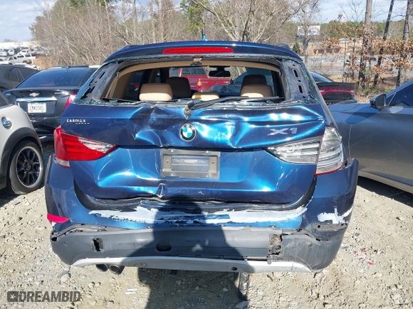 2013 BMW X1 28i with VIN WBAVM1C52DVW46153, listed as a IAAI auction lot 41236419 with 160,732 mi miles. Bid and sale history available at carsss.com. Image 16.