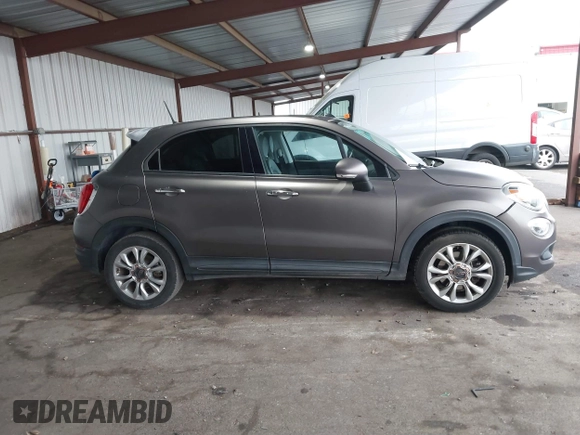 2016 FIAT 500X Easy z VIN ZFBCFXBTXGP349005, wystawiony jako IAAI lot #41163593 z przebiegiem 69 012 mil mil oraz . Historia ofert i sprzedaży dostępna na DreamBid. Obrazek 13.