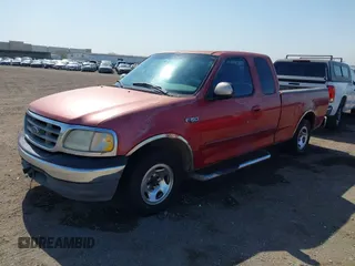 2000 Ford F-150 XL with VIN 1FTZX1723YKB49308, listed as a IAAI auction lot 41987680 with 1 mi miles. Bid and sale history available at carsss.com. Image 2.