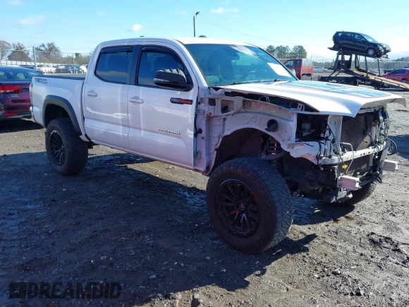 2020 Toyota Tacoma SR5 with VIN 3TMAZ5CN4LM132002, listed as a IAAI auction lot 41224844 with 55,000 mi miles and . Bid and sale history available at DreamBid. Image 1.