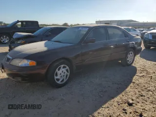 2001 Mazda 626 LX with VIN 1YVGF22D315215931, listed as a Copart auction lot 45399205 with 46,858 mi miles and Clean Title. Bid and sale history available at carsss.com. Image 1.