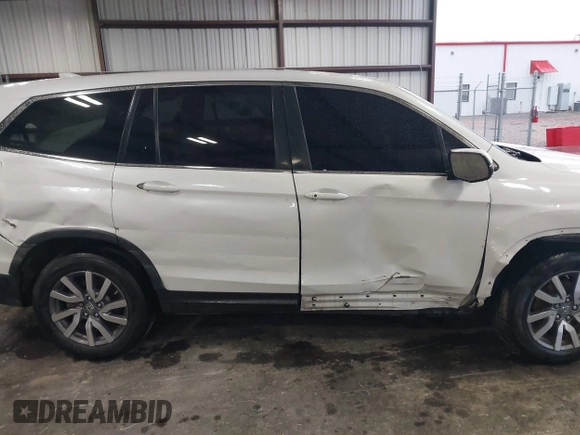 2021 Honda Pilot EX-L with VIN 5FNYF5H57MB022843, listed as a IAAI auction lot 41186957 with 57,836 mi miles. Bid and sale history available at carsss.com. Image 13.