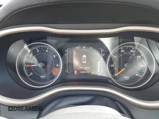 2015 Jeep Cherokee Latitude with VIN 1C4PJLCB8FW620336, listed as a IAAI auction lot 41634997 with 130,335 mi miles. Bid and sale history available at carsss.com. Image 7.