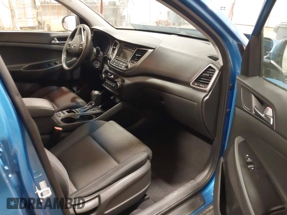 2017 Hyundai Tucson SE with VIN KM8J23A41HU395629, listed as a IAAI auction lot 41340592 with 119,568 mi miles. Bid and sale history available at carsss.com. Image 5.