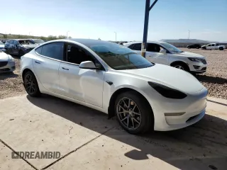 2021 Tesla Model 3 Standard Range Plus with VIN 5YJ3E1EA7MF978749, listed as a Copart auction lot 43377955 with 51,871 mi miles and Salvage Title. Bid and sale history available at carsss.com. Image 4.